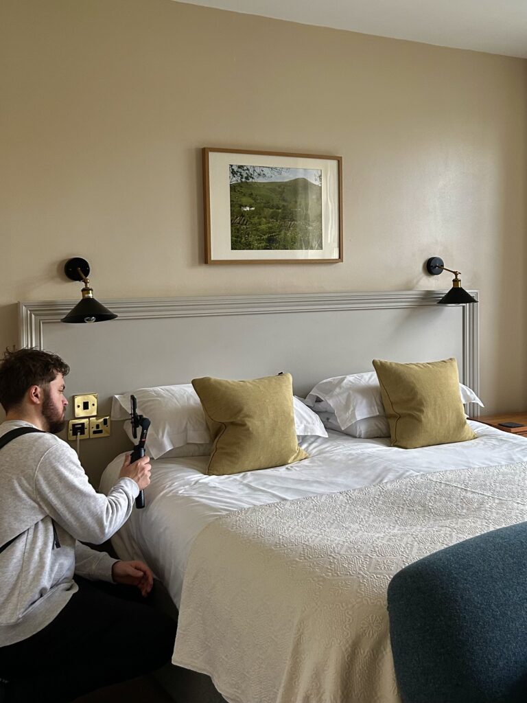 Man filming content to create a Reels video for a hotel - Arise Hotel Marketing