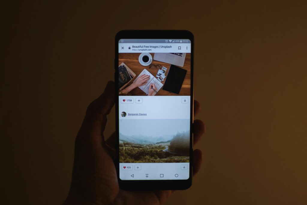 social media on the phone screen - arise hotel marketing